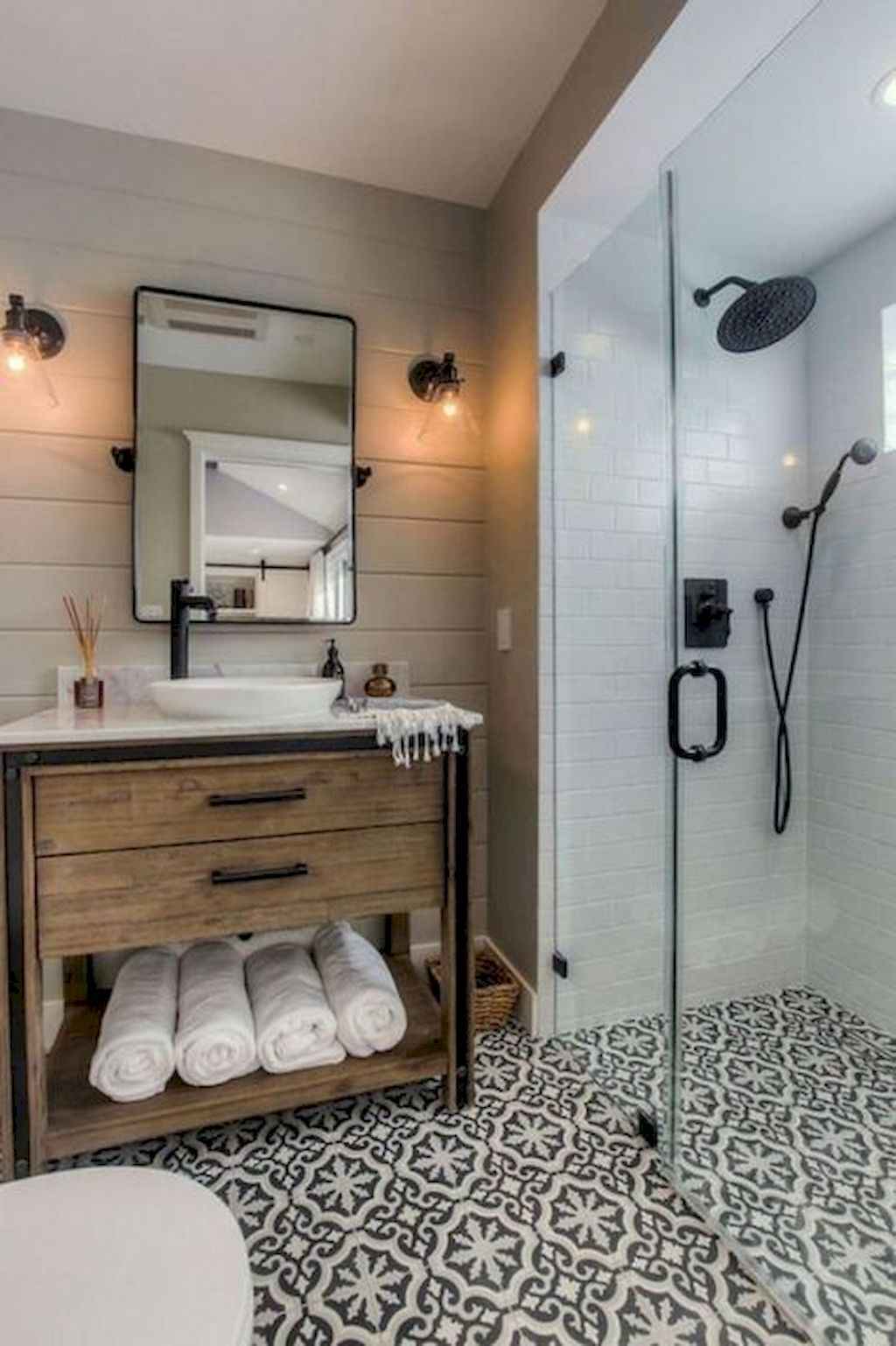 Warm farmhouse bathroom with walk-in shower and pattern tile